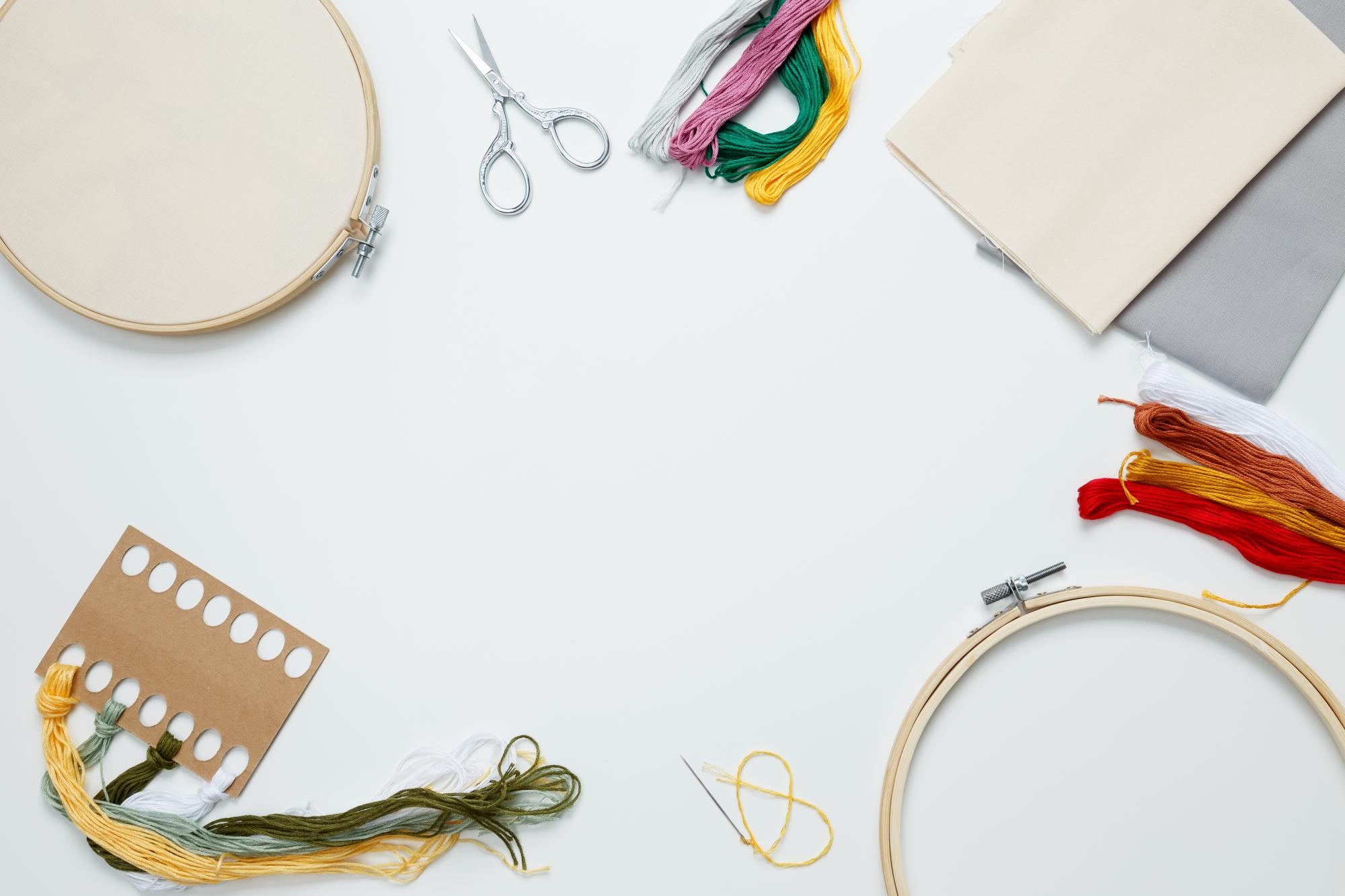 Studio table with hoops and threads